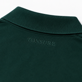 Detaljefoto af Tonsure logo eksklusivt broderet i nakken
